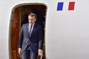 French President Emmanuel Macron arrives at Hamburg Airport. 
