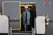 British Prime Minister Theresa May and her husband Philip arrive at Hamburg Airport. 