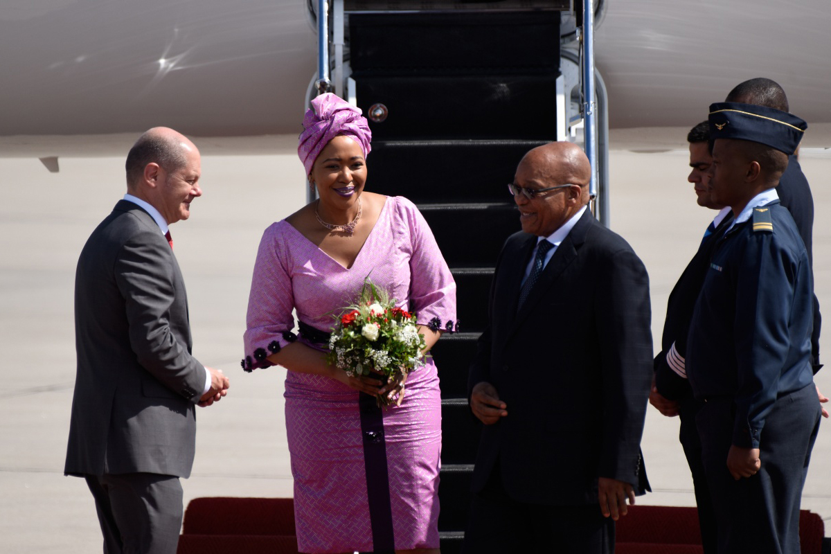 Olaf Scholz, First Mayor of Hamburg, welcomes South African President Jacob Zuma and his wife Tobeka Madiba at the Hamburg Airport.