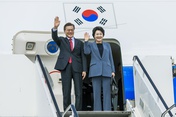 Korean President Moon Jae-in and his wife Kim Jung-sook arrive at the Hamburg Airport.