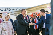 Turkish President Recep Tayyip Erdoğan and his wife Emine arrive at Hamburg Airport.