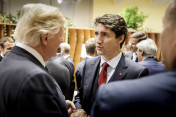 Justin Trudeau, Prime Minister of Canada, talks with US President Donald Trump before the first working meeting on global growth and trade.