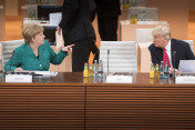 Federal Chancellor Angela Merkel in conversation with US President Donald Trump before the start of the third working session.