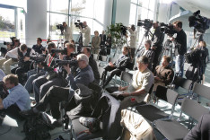 Reporter bei einer Presse-Konferenz