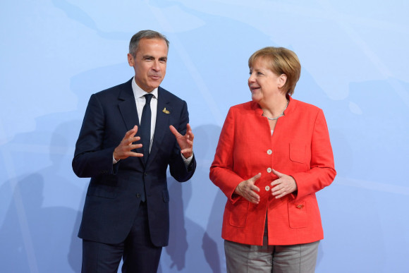 Federal Chancellor Angela Merkel welcomes Mark Carney, Chairman of the Financial Stability Board (FSB), to the G20 Summit in Hamburg. 