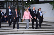 Federal Chancellor Angela Merkel and her husband Joachim Sauer arrive at the Elbphilharmonie for the evening programme.