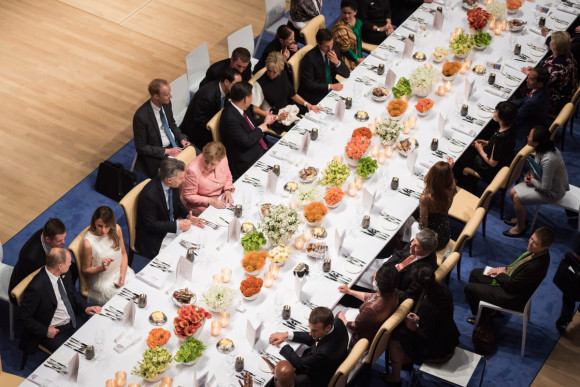 The G20 heads of state and government and their accompanying partners enjoying a banquet in the Elbphilharmonie.