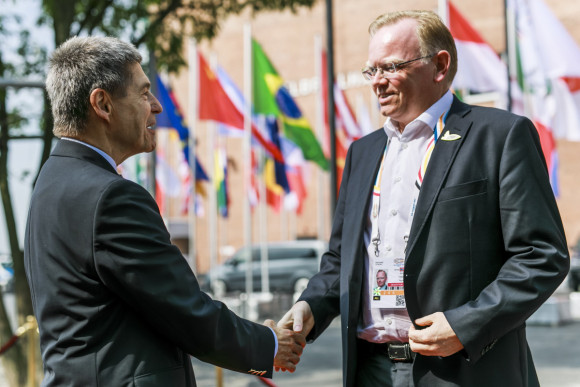 Joachim Sauer, husband of the German Chancellor, welcomes Sindre Finnes, husband of Norwegian Prime Minister Erna Solberg, as part of the G20’s Partner Programme.