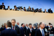 Press photographers follow the kick-off meeting of the G20 summit.