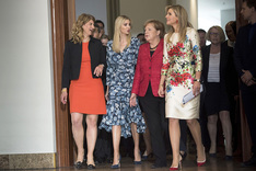 During the Woman20 Summit Chancellor Angela Merkel walks alongside Stephanie Bschorr, Ivanka Trump and Queen Máxima of the Netherlands.