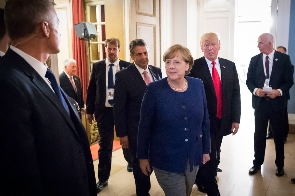 Chancellor Angela Merkel welcomes US President Donald Trump to bilateral talks ahead of the G20 Summit.