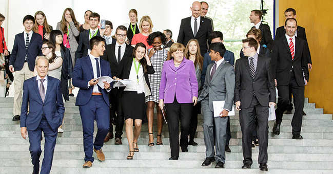 Chancellor Angela Merkel and young people at the Federal Chancellery